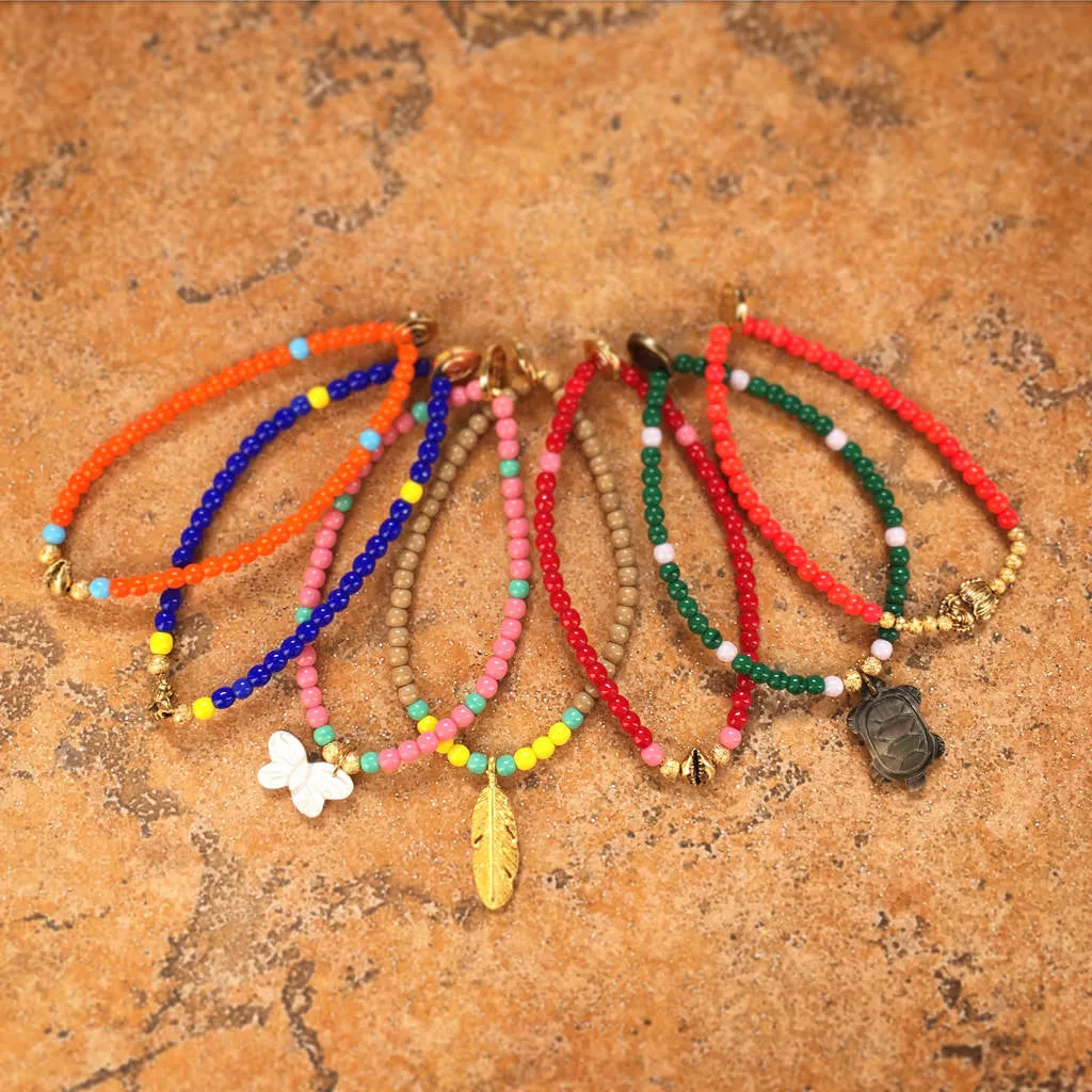 Mother of Pearl Turtle Charm Glass Bead Bracelet