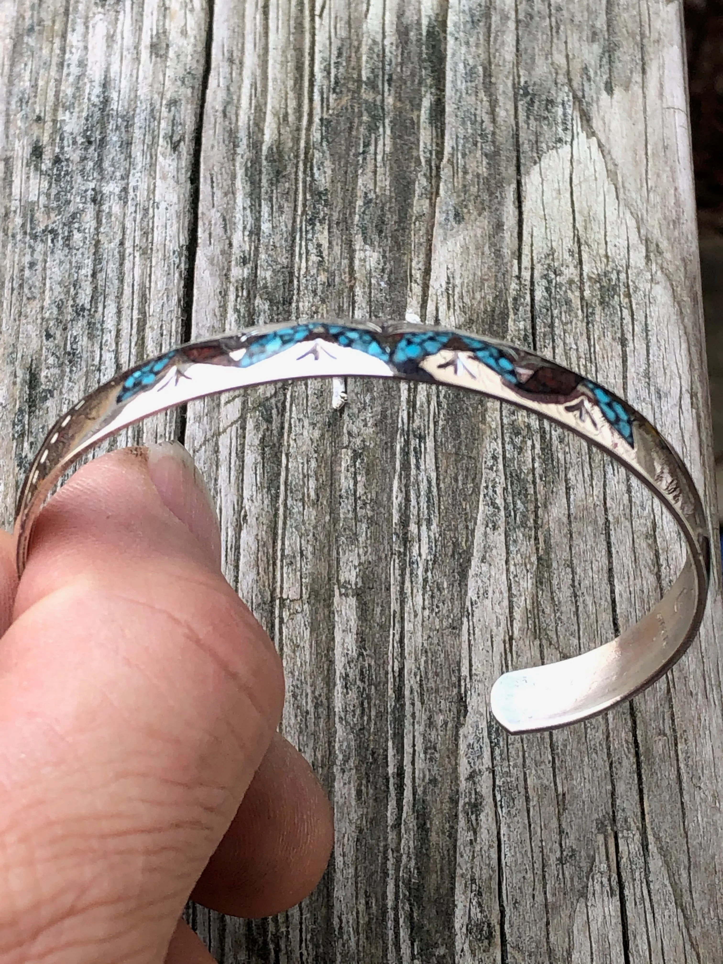 Silver stamped bracelet with Coral and Turquoise chip inlay